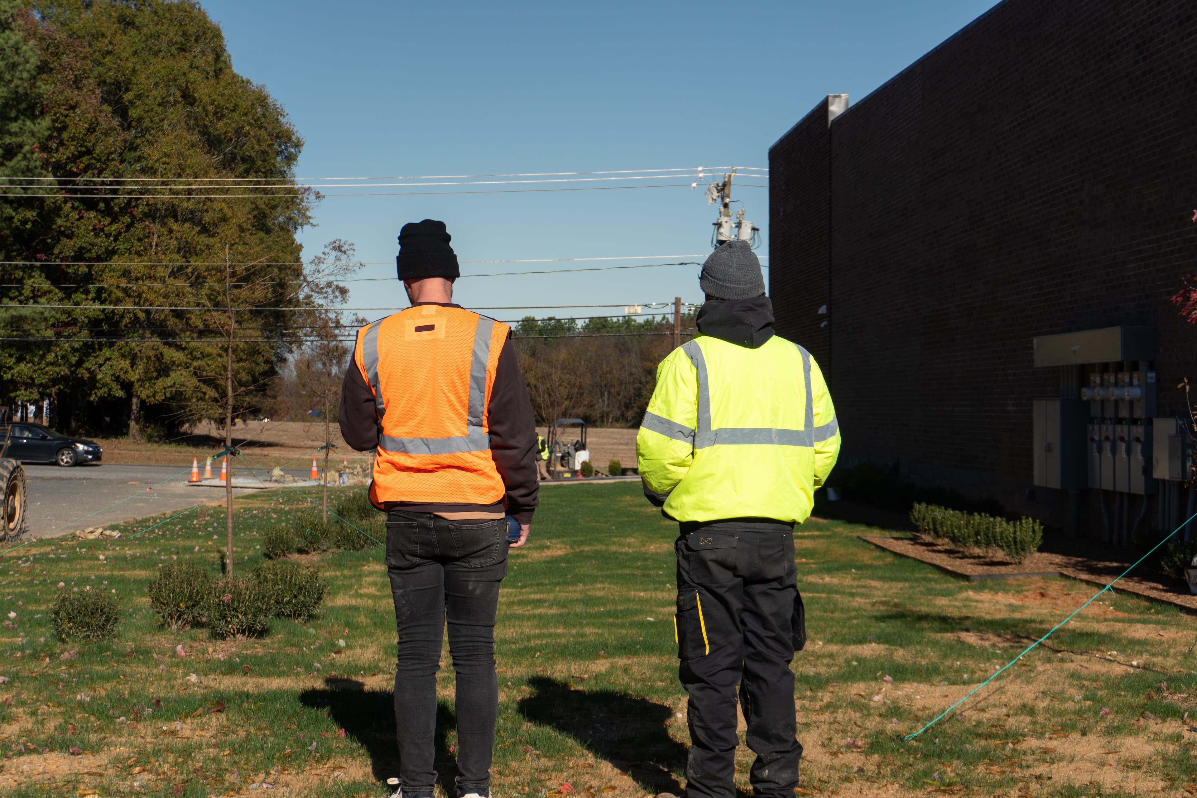 K&Y Builders founders overlooking a job site