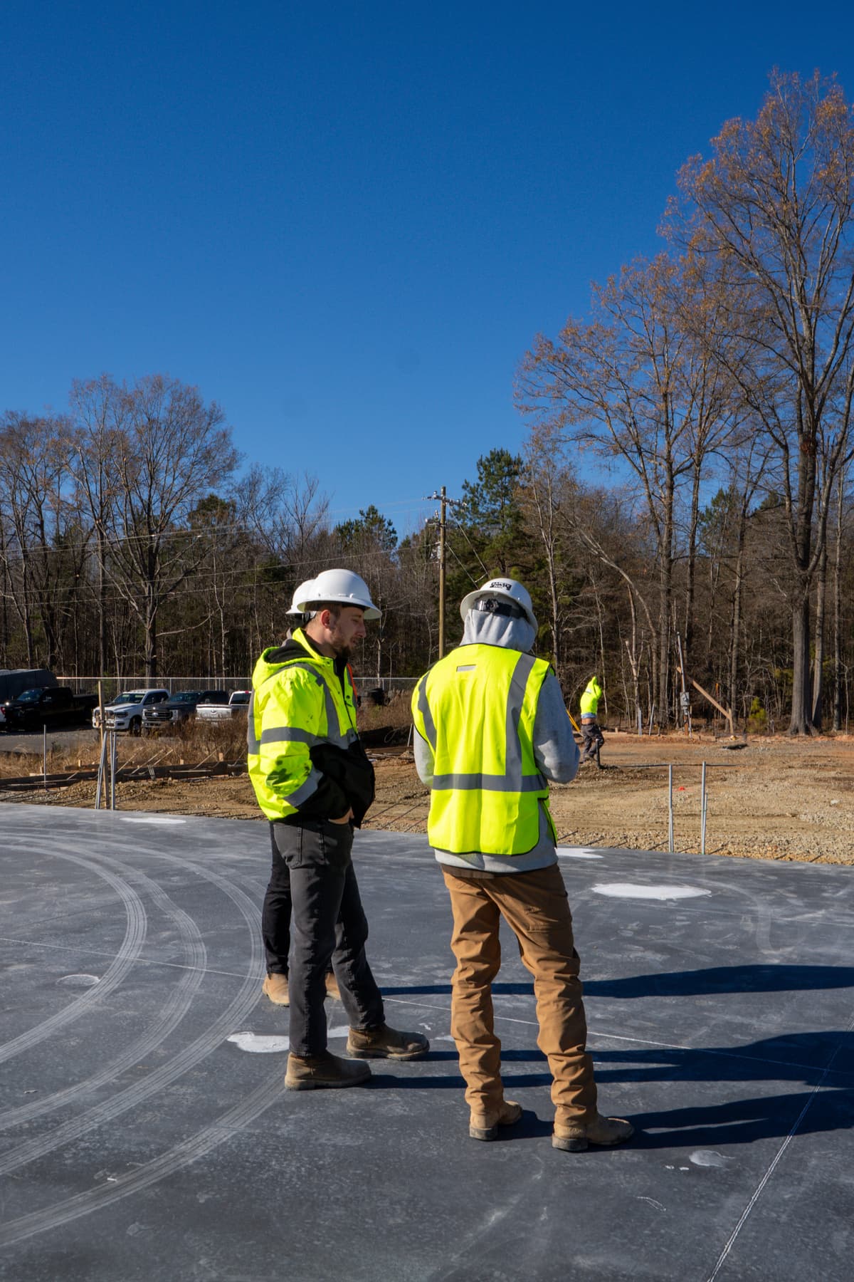 K&Y team reviewing plans on site
